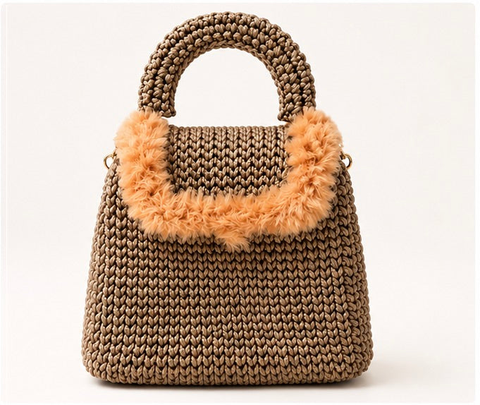 Handmade crochet handbag with top handles, adjustable gold chain strap, turn-lock closure, and gold-tone hardware.